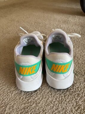Nike Metcon Sneakers with Teal Band and Yellow Logo